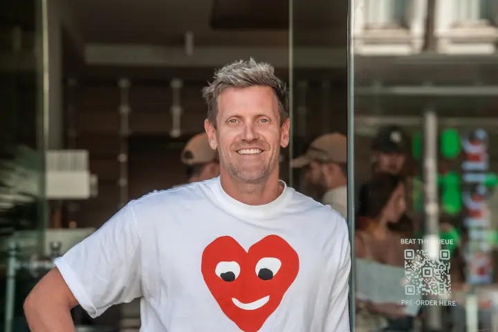 Green Cup co-founder Simon Guest standing in front of store