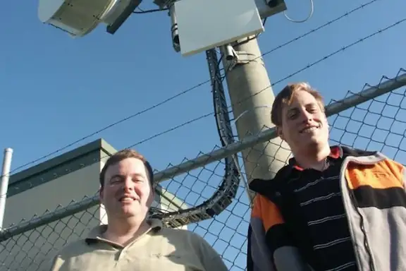 Managing Director Phillip Britt and General Manager of Provisioning Leigh Markham at one of the first tower installations.